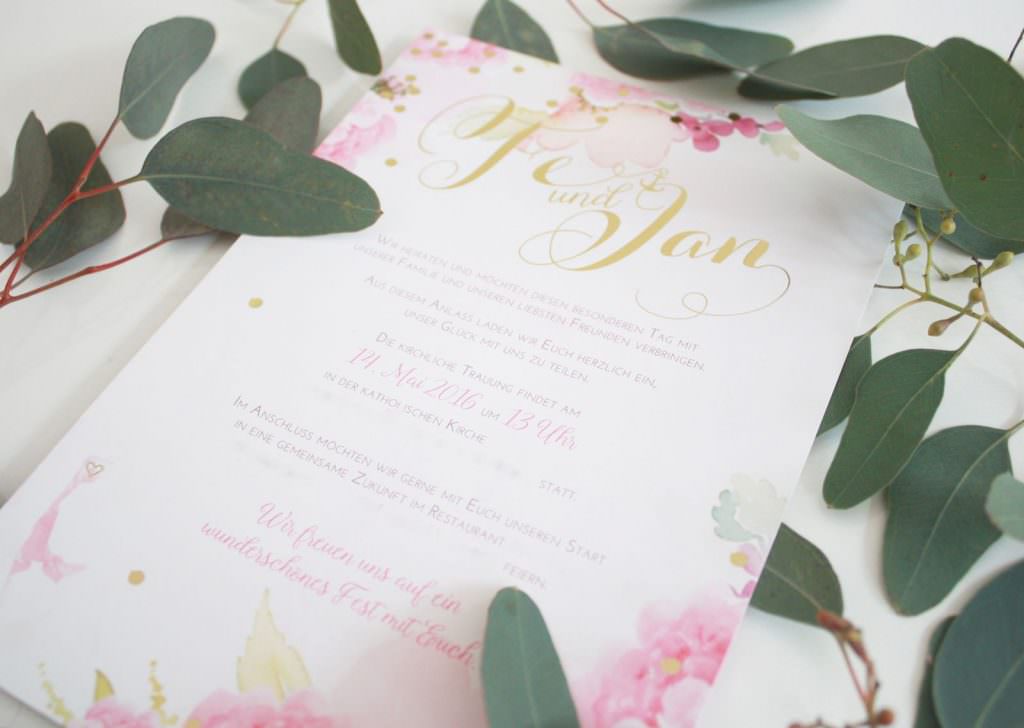 Watercolor Hochzeitseinladung mit Schrift in Rosa und Gold
