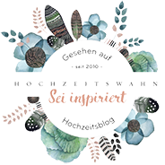 badge mit Blumenkranz und 